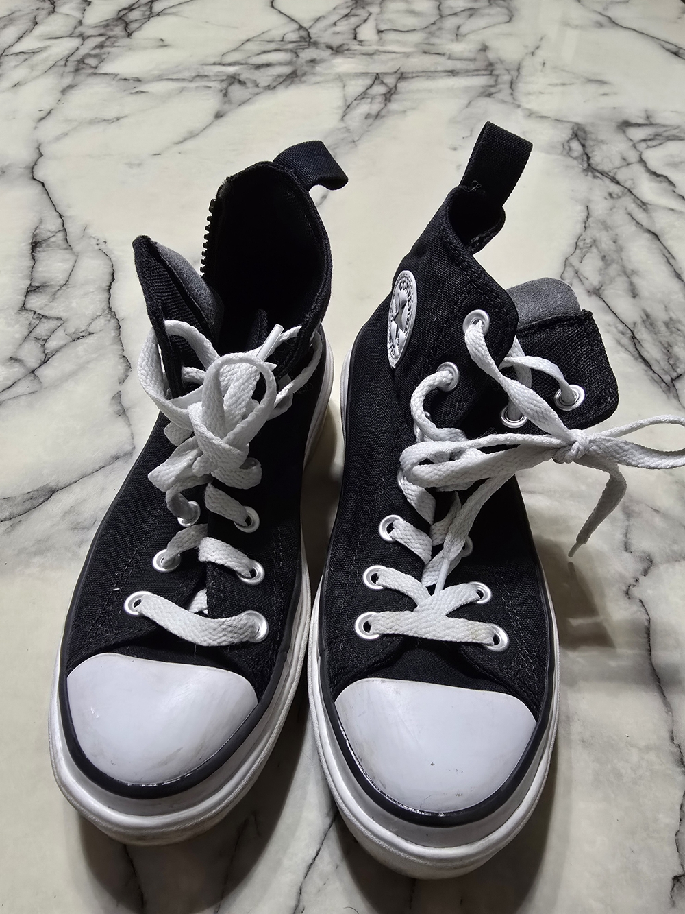Converse Black and White High-Top Sneakers